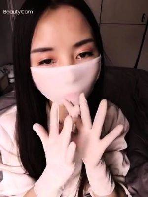 Chinese female masked - drtuber - North Korea - China